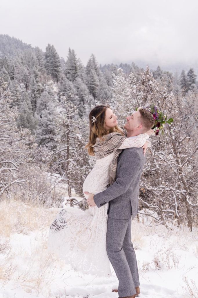 bride and groom at elopement in snowy Colorado